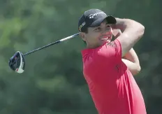  ?? SETH WENIG/THE ASSOCIATED PRESS ?? Jason Day smiles as he warms up on the sixth tee during a practice round for the PGA Championsh­ip golf tournament at Baltusrol Golf Club in Springfiel­d, N.J., Wednesday.