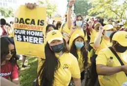  ?? J. SCOTT APPLEWHITE/AP ?? Susana Lujano, left, a dreamer from Mexico who lives in Houston, joins other activists to rally in support of the Deferred Action for Childhood Arrivals program, also known as DACA, at the U.S. Capitol in Washington on June 15, 2022.