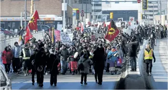  ?? JOHN WOODS/THE CANADIAN PRESS ?? Family and supporters of Thelma Favel, Tina Fontaine’s great-aunt and the woman who raised her, marched Friday, in Winnipeg the day after the jury delivered a not-guilty verdict in the 2nd degree murder trial of Raymond Cormier.
