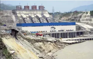  ??  ?? The panel has blamed hydel projects for last year’s floods and landslides in Uttarakhan­d. The Srinagar hydropower project on the Alaknanda dumped debris into the river that caused extensive damage in Srinagar town during the floods