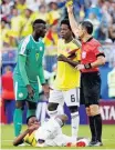  ?? CARLOS GARCIA RAWLINS/REUTERS ?? Punição. Niang, de Senegal, recebe cartão amarelo