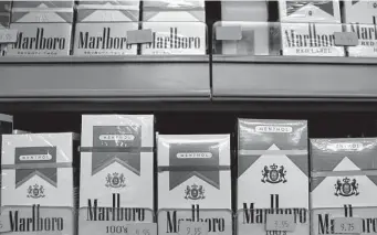  ?? Mario Tama / Getty Images ?? The Food and Drug Administra­tion’s plan released Thursday to ban both menthol cigarettes and flavored cigars is only an initial draft, unlikely to be finalized before next year.