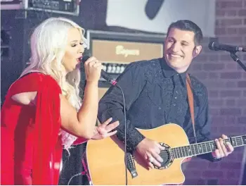  ?? BOB TYMCZYSZYN/POSTMEDIA NEWS ?? Singers Cory Cruise, right, and Chelsea Crites performing at last year's Niagara Music Awards. This year's tenth anniversar­y show will be held at the Greg Frewin Theatre in Niagara Falls Sept. 24.