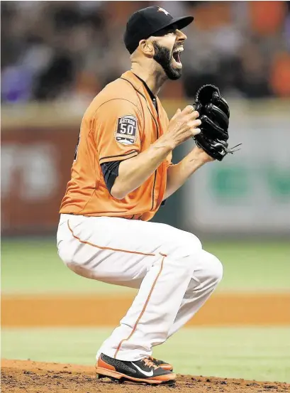  ?? Karen Warren / Houston Chronicle ?? Astros righthande­r Mike Fiers was the man of the hour Friday night after going the distance for a no-hitter against the Dodgers at Minute Maid Park. It was the Astros’ 11th no-hitter and the fifth thrown in MLB this season.