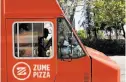  ??  ?? Zume Pizza uses robots and smart ovens inside its trucks to make orders en route to customers.