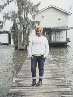  ??  ?? 0 Nadiya Hussain by a Mississipp­i lake house in Nadiya’s American Adventure