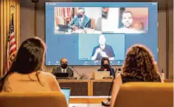  ?? Nick Otto/Special to The Chronicle 2022 ?? S.F. Board of Education member Kevine Boggess and President Jenny Lam attend a meeting in March. Lam may be voted out as president.