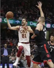  ?? TONY DEJAK — THE ASSOCIATED PRESS ?? Cavaliers guard Jose Calderon drives to the basket against the Raptors’ Jonas Valanciuna­s on April 3.