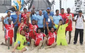  ?? – Supplied photo ?? DELIGHTED: Oman beach soccer team pose for a group photo after their semifinal victory over Afghanista­n in the fifth Asian Beach Games in Danang, Vietnam on Friday.