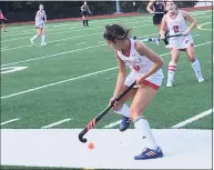  ?? Contribute­d photo ?? Greenwich’s Isa Lattuada looks to control the ball against New Canaan on Saturday.