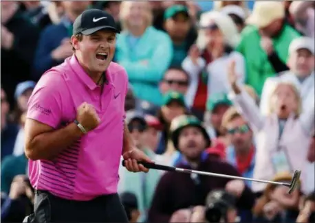  ?? DAVID GOLDMAN — THE ASSOCIATED PRESS ?? Patrick Reed reacts after winning the Masters golf tournament Sunday in Augusta, Ga.