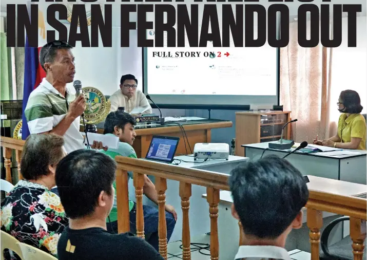  ?? SUNSTAR FOTO / ALEX BADAYOS ?? SAN FERNANDO. Acting Vice Mayor Philip Jude Medalla convenes the municipal council for a special session to hear the security concerns raised by those named in a second “kill list.” Felomino Leyson (standing, with microphone), San Fernando Purok Federation president, and three others named in the list (backs to the camera) showed up at the council meeting on Monday, March 4, to air their worries over the peace and order in their town.