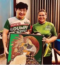  ?? ?? CHEF Patrick presenting his gift of an eagle painting by Tanya Gaisano-Lee to Mayor Sara Duterte-Carpio