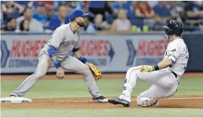  ?? — AP ?? Tampa Bay Rays’ Evan Longoria made it to third base on hits twice in Tuesday’s 6-5 win over Jose Bautista and the Toronto Blue Jays.