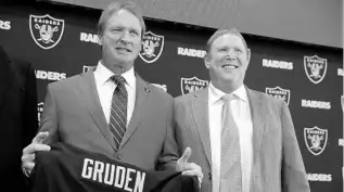  ?? JUSTIN SULLIVAN/GETTY IMAGES ?? Broadcaste­r Jon Gruden, left, was brought back to the Oakland Raiders as coach this month by owner Mark Davis, the son of the man who traded Gruden to the Tampa Bay Buccaneers after the 2001 season.