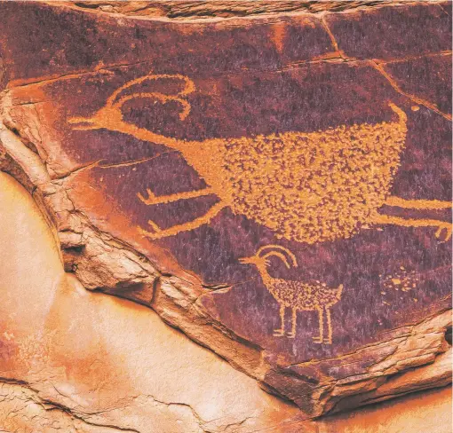  ??  ?? The “leaping sheep” glyph at the Eye of the Sun Arch in Monument Valley, an example of ancient rock art in the Southwest; opposite page, left, the “big house” that lends its name to Casa Grande Ruins National Monument is located in the Hohokam...