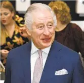  ?? PAUL ELLIS AP ?? Britain’s King Charles III visits the headquarte­rs of cereal manufactur­er Kellogg’s on Friday to mark its 100th anniversar­y in Manchester, England.