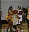  ?? PAUL DICICCO — FOR THE NEWS-HERALD ?? Alexus Reese of Euclid pulls the ball away and heads up court during a district semifinal loss to Brush on Feb. 26.