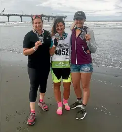  ??  ?? Team Stuffed, Deanna McKay, Olivia Caldwell and Suzanne Black made it to the finish line in New Brighton for the Coast to Coast.