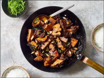  ?? BRYAN GARDNER — THE NEW YORK TIMES ?? Glazed tofu with chile and star anise.