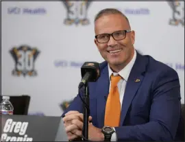  ?? ASHLEY LANDIS — THE ASSOCIATED PRESS ?? Greg Cronin speaks to reporters during a news conference announcing him as the new head coach of the Anaheim Ducks in Anaheim, Calif., on Monday.