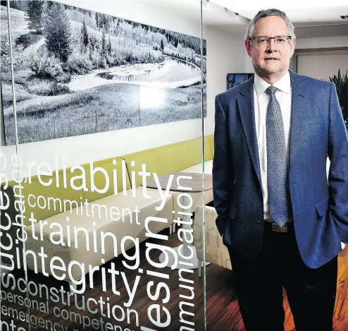  ?? LEAH HENNEL/ POSTMEDIA NEWS ?? Husky Energy Inc.’s new chief executive Rob Peabody at the company’s offices in Calgary.