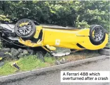  ??  ?? A Ferrari 488 which overturned after a crash