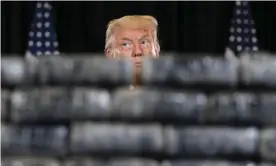  ?? Photograph: Saul Loeb/AFP/Getty ?? US President Donald Trump attends a briefing on enhanced narcotics operations at the US Southern Command in Doral, Florida, on Friday.