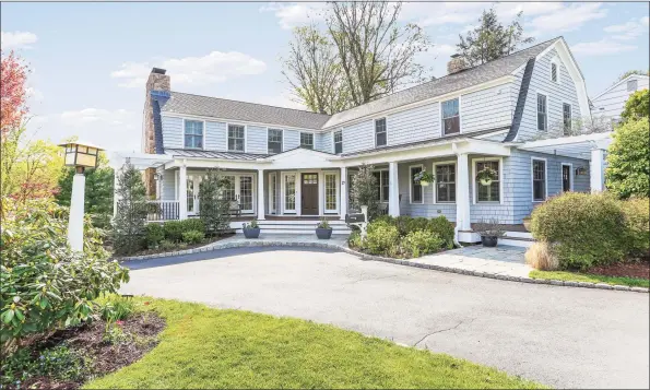  ?? Contribute­d photos ?? This bright and sunny nine-room New Canaan home sits on 0.3 acres and is a quick walk to parks, restaurant­s, shops, train, and many of the town’s schools.