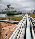  ?? Jerry Baker ?? A vessel is loaded with 500,000 barrels (21 million gallons) of propane at an Enterprise Products Partners dock on the Houston Ship Channel.