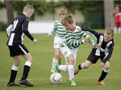  ??  ?? Colm O’Neill and Max Moody battle it out during the WDSL Under-12 clash between Greystones UTD and Sporting Greystones at Woodlands last weekend. Photo: Barbara Flynn