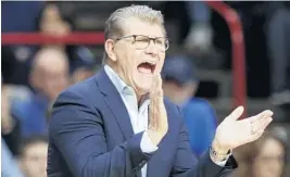  ?? FRANK FRANKLIN II/AP ?? Connecticu­t head coach Geno Auriemma’s team is 147-1 over the past four seasons. The Huskies face Notre Dame in one of the semifinals Friday.