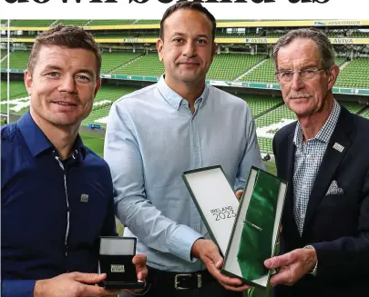 ??  ?? Leaders of the pack: Brian O’Driscoll, Leo Varadkar and Dick Spring in the Aviva yesterday