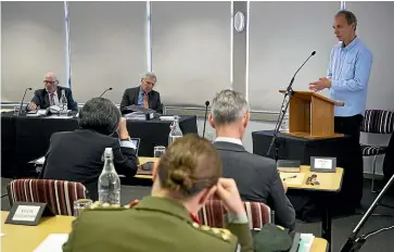  ?? ROSS GIBLIN/STUFF ?? Inquiry members Sir Geoffrey Palmer, left and Chair, Sir Terence Arnold listening to
Nicky Hager at the inquiry into Operation Burnham, which inspected claims in the book Hit & Run, which alleged six Afghani civilians were killed and 15 injured in the SAS operation.