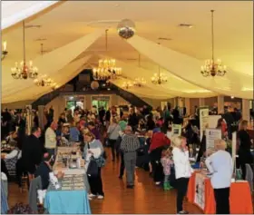  ?? MICHILEA PATTERSON — DIGITAL FIRST MEDIA ?? People visit vendor tables during the Healthy Lifestyle Exop at SunnyBrook Ballroom in Lower Pottsgrove May 5. The annual event is organized by state Rep. Tom Quigley, R-146th Dist.