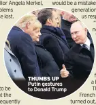  ??  ?? THUMBS UP Putin gestures to Donald Trump