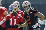  ?? MARCIO JOSE SANCHEZ / ASSOCIATED PRESS ?? 49ers QB Brian Hoyer (2) found out during offseason work that receiver Marquis Goodwin (11) had improved his route-running skills.