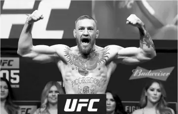  ??  ?? Featherwei­ght champion Conor McGregor reacts during UFC 205 Weigh-ins at Madison Square Garden in New York City, in this November 11, 2016 file photo. — AFP photo