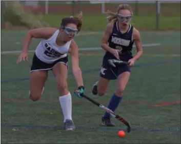  ?? PETE BANNAN – DIGITAL FIRST MEDIA ?? Radnor’s Hope Delaney, left, and Merion Mercy’s Mallory McHale go for a loose ball Thursday in the District 1 Class 4A field hockey playoffs. Merion Mercy won, 1-0.