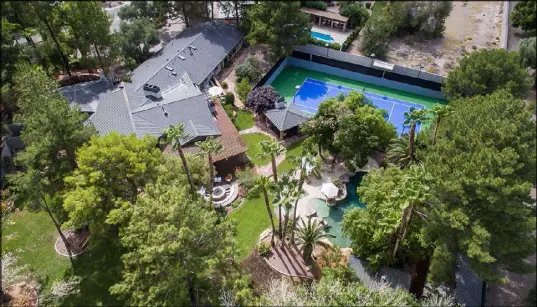  ?? Simply Vegas ?? This Winchester District historical compound with two large homes and a tennis court has been listed for $2.75 million.