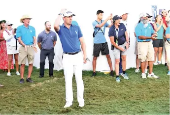  ?? - AFP photo ?? Justin Thomas of the United States reacts to a shot during the first playoff hole during a during the final round of the Sentry Tournament Of Champions at the Kapalua Plantation Course in Kapalua, Hawaii.