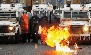  ?? ?? Ablaze: Divisions over the Northern Ireland Protocol led to clashes in Belfast in April