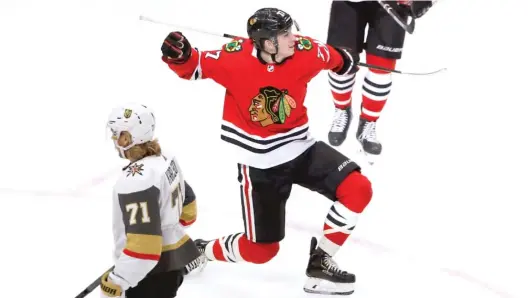  ?? CHARLES REX ARBOGAST/AP ?? Blackhawks rookie center Kirby Dach celebrates his first NHL goal last fall against the Knights. He also had his first two-point game against them.