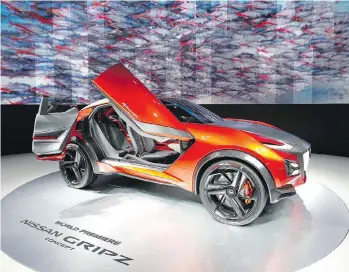  ?? DANIEL ROLLAND/AFP/GETTY IMAGES/FILES ?? The Nissan Gripz hybrid concept, unveiled last year in Frankfurt, is powered by the company’s new e-Power system that may find itself in a production model this year.