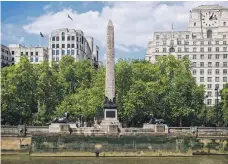  ?? AFP; Getty; Alamy ?? From top, Egyptian archaeolog­ist and former minister of antiquitie­s Zawi Hawass near the Giza Pyramids last year; Cleopatra’s Needle is encased for its sea journey from Egypt to London in 1877; and the obelisk next to the river Thames in London