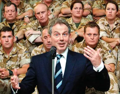  ??  ?? Meet the troops: Tony Blair addresses British soldiers in Basra during a visit to Iraq in 2007