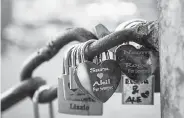  ?? Giovanni Cipriano, © The New York Times Co. ?? Padlocks left by couples on the Ponte Milvio bridge in Rome, on Feb. 2.