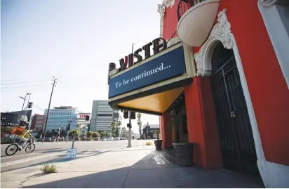  ?? (Mario Anzuoni/Reuters) ?? LOS ANGELES’S Vista Theatre on Sunset Boulevard amid the coronaviru­s outbreak, which has hit the homeless community particular­ly hard and has drawn attention to the need for adequate short-term housing options.