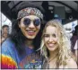  ??  ?? Omar Moreno and Melanie Marraffa, of Arizona, head to the Grateful Dead show.