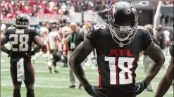  ?? CURTIS COMPTON/AJC 2021 ?? Receiver Calvin Ridley, then with the Falcons, missed the 2022 season for gambling on NFL games a year earlier. He recently signed with the Titans.